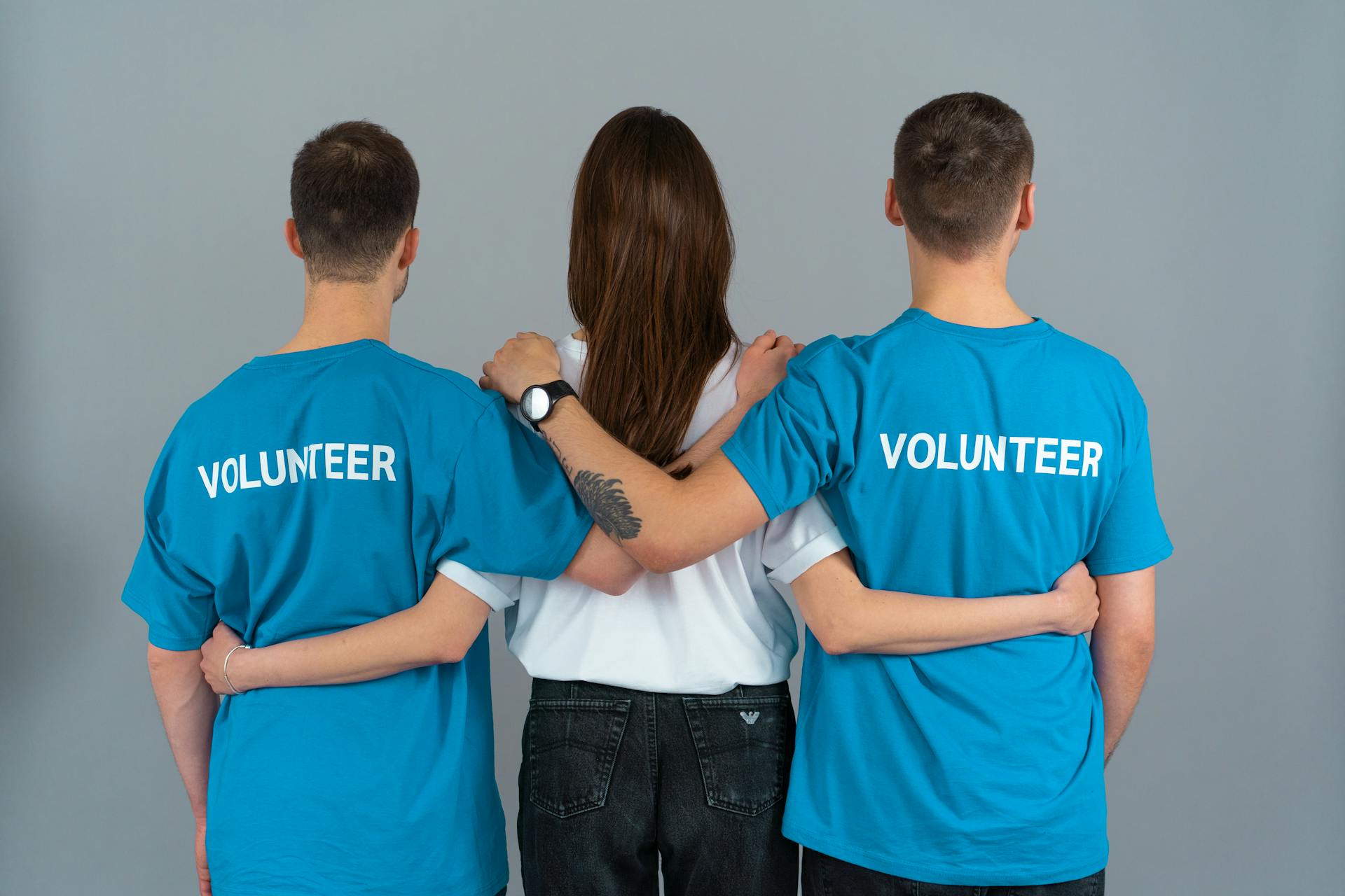 picture of three volunteer staff